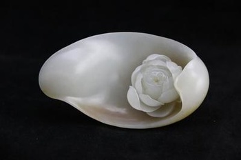 玉器上雕刻的莲花寓意是什么? 荷花在玉的题材上都有哪些寓意?